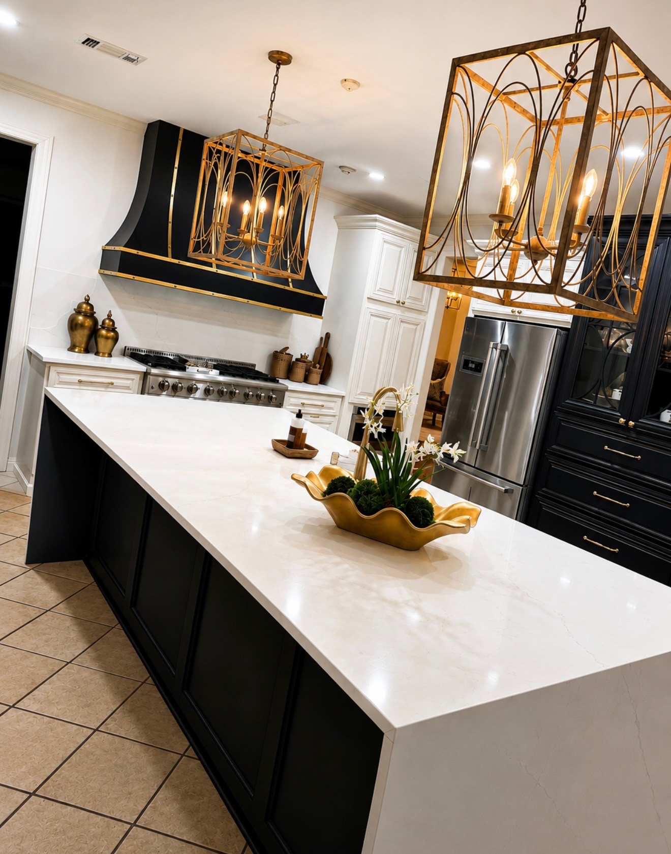 Kitchen design with black cabinetry and gold pendants